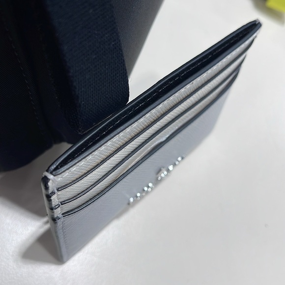 Kate Spade Madison Small Slim Card Holder
Platinum Grey Multi
NWT - Picture 15 of 16